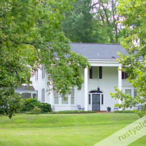 photo of house near bridge