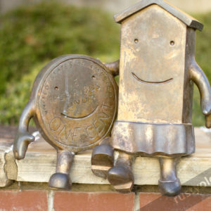 photo of bronze cartoon character statues