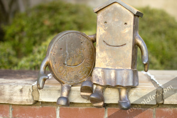 photo of bronze cartoon character statues